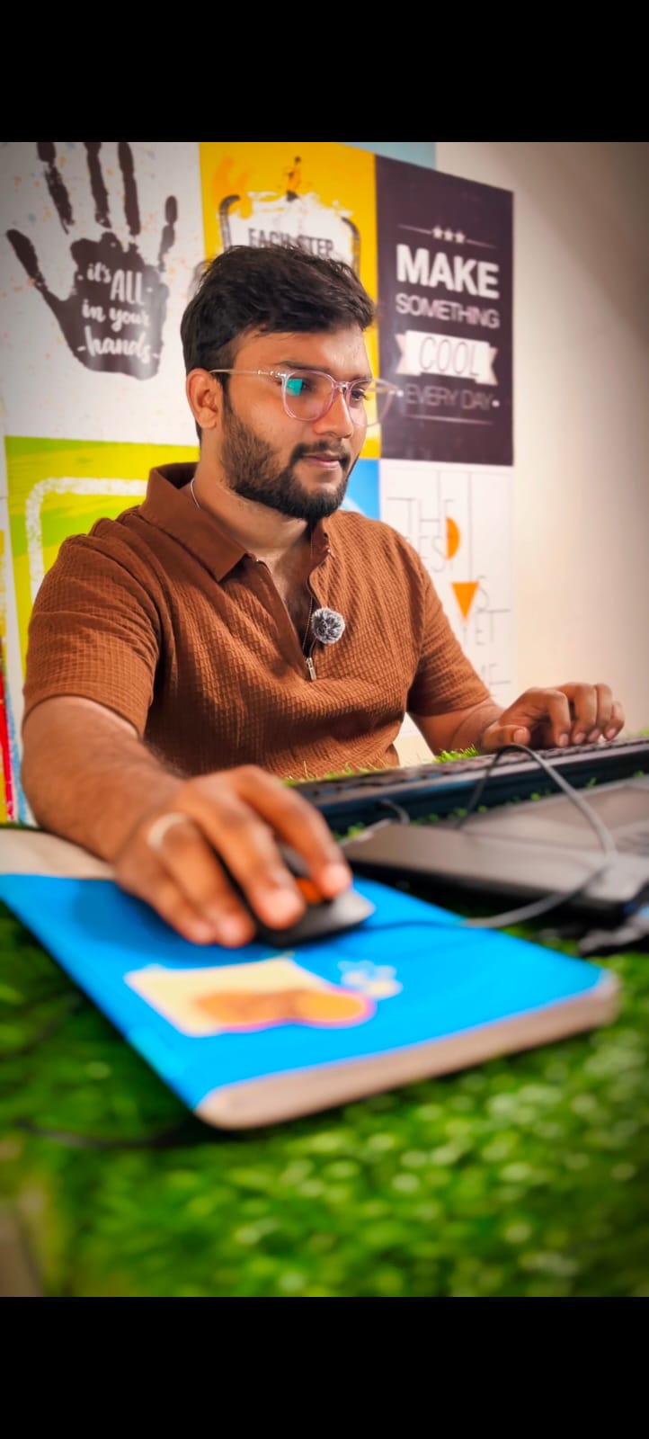 Chaitanya working at desk